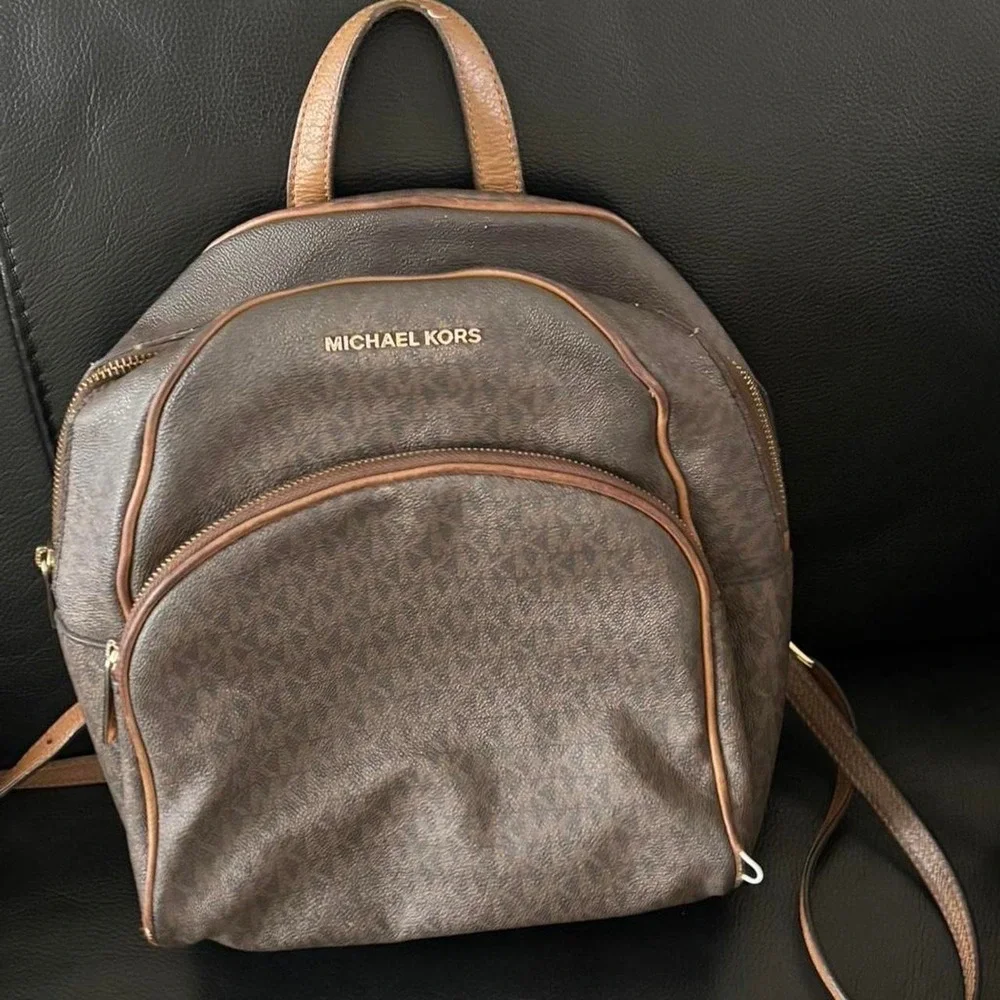 Michael‎ Kors brown monogram backpack purse with gold hardware